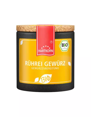 Pappdose mit rotem Etikettband und gelbem Etikett mit der Aufschrift „RÜHREI GEWÜRZ GEWÜRZZUBEREITUNG“