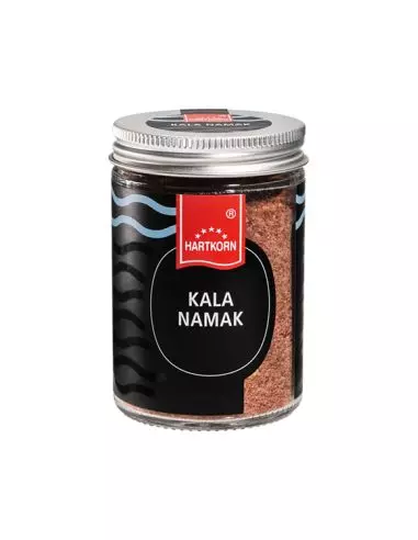Glas mit rosa-schwarzem Kala Namak Salz und Schraubdeckel, Etikett mit Produktname