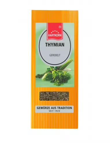 Flachbeutel mit der Aufschrift „THYMIAN gerebelt“, grüne Kräuterzweige im Hintergrund.